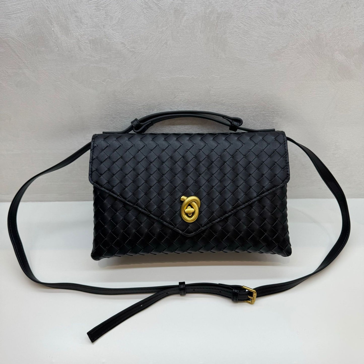 Knot Lock Leather Top Handle Bag