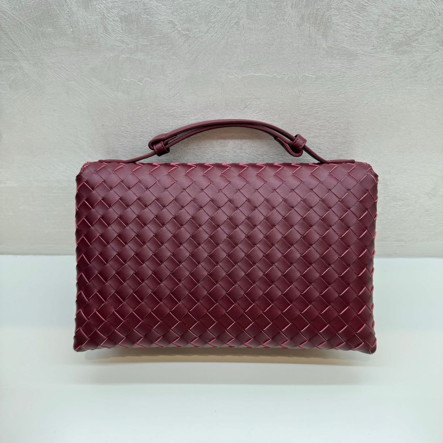 Knot Lock Leather Top Handle Bag