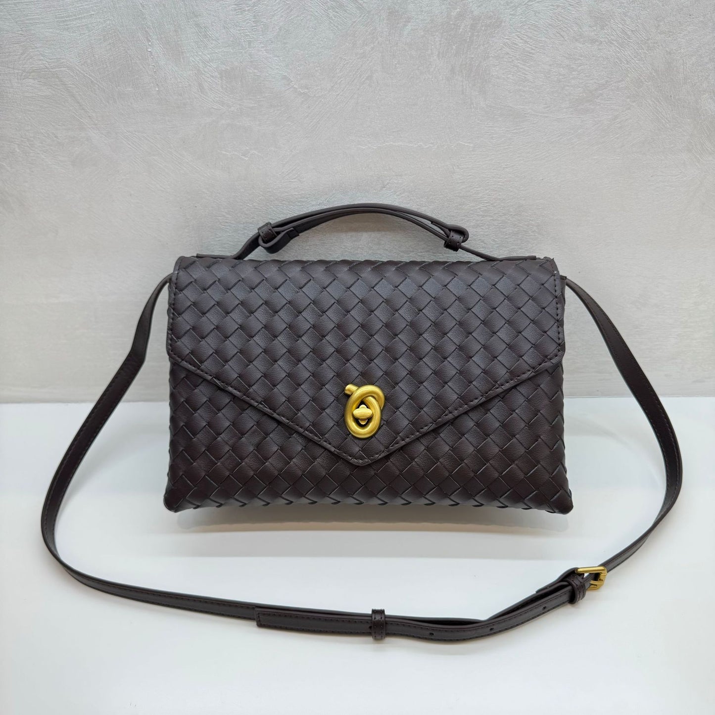 Knot Lock Leather Top Handle Bag