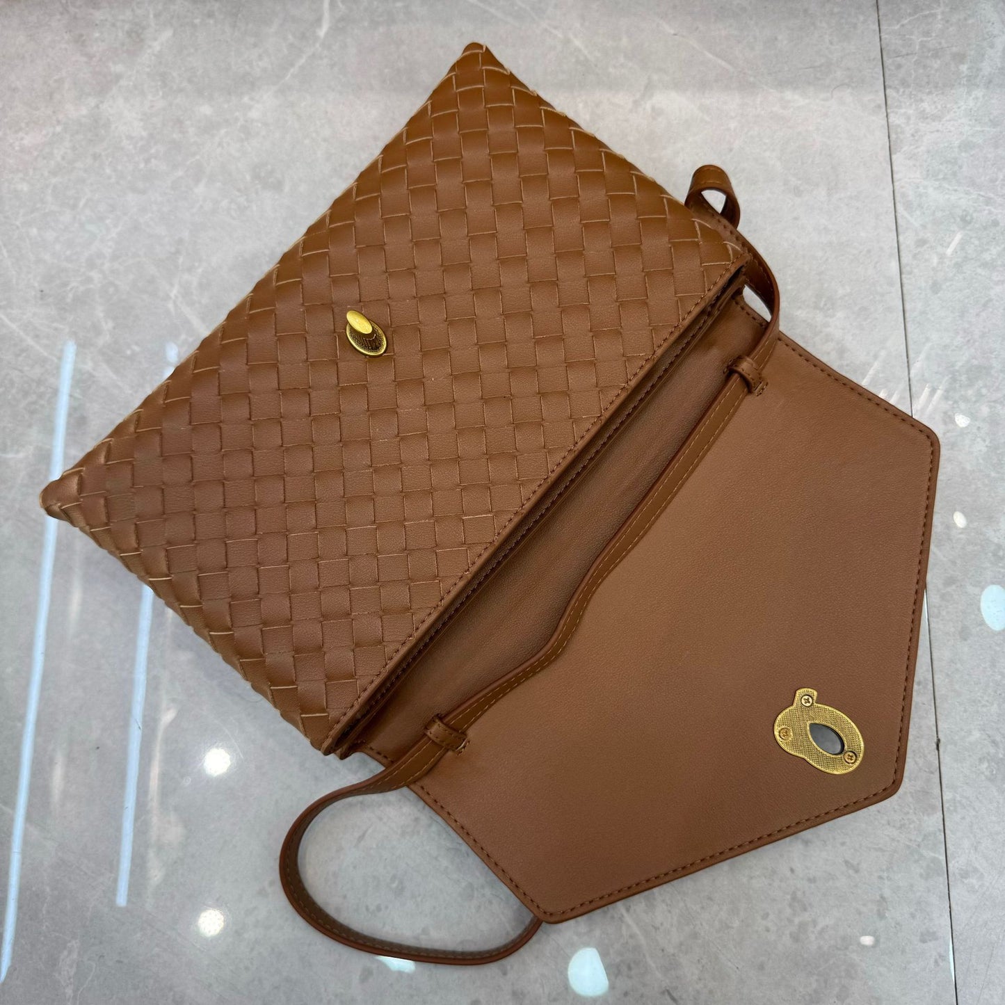 Knot Lock Leather Top Handle Bag