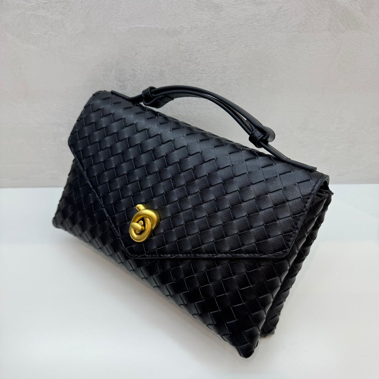 Knot Lock Leather Top Handle Bag