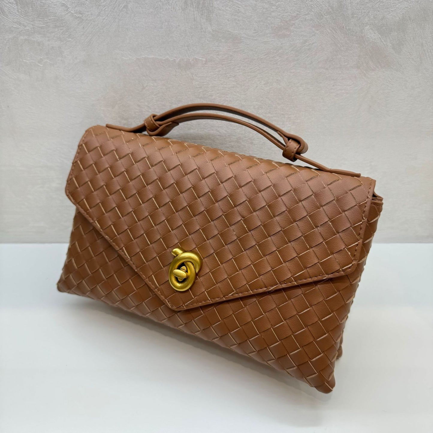 Knot Lock Leather Top Handle Bag