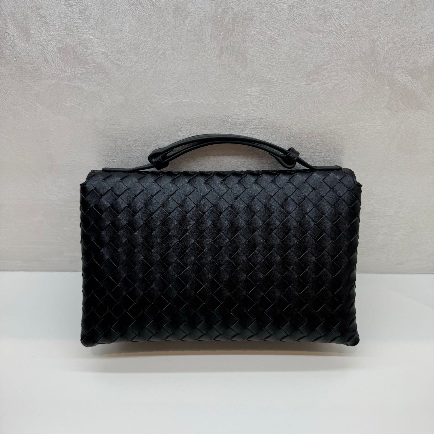 Knot Lock Leather Top Handle Bag