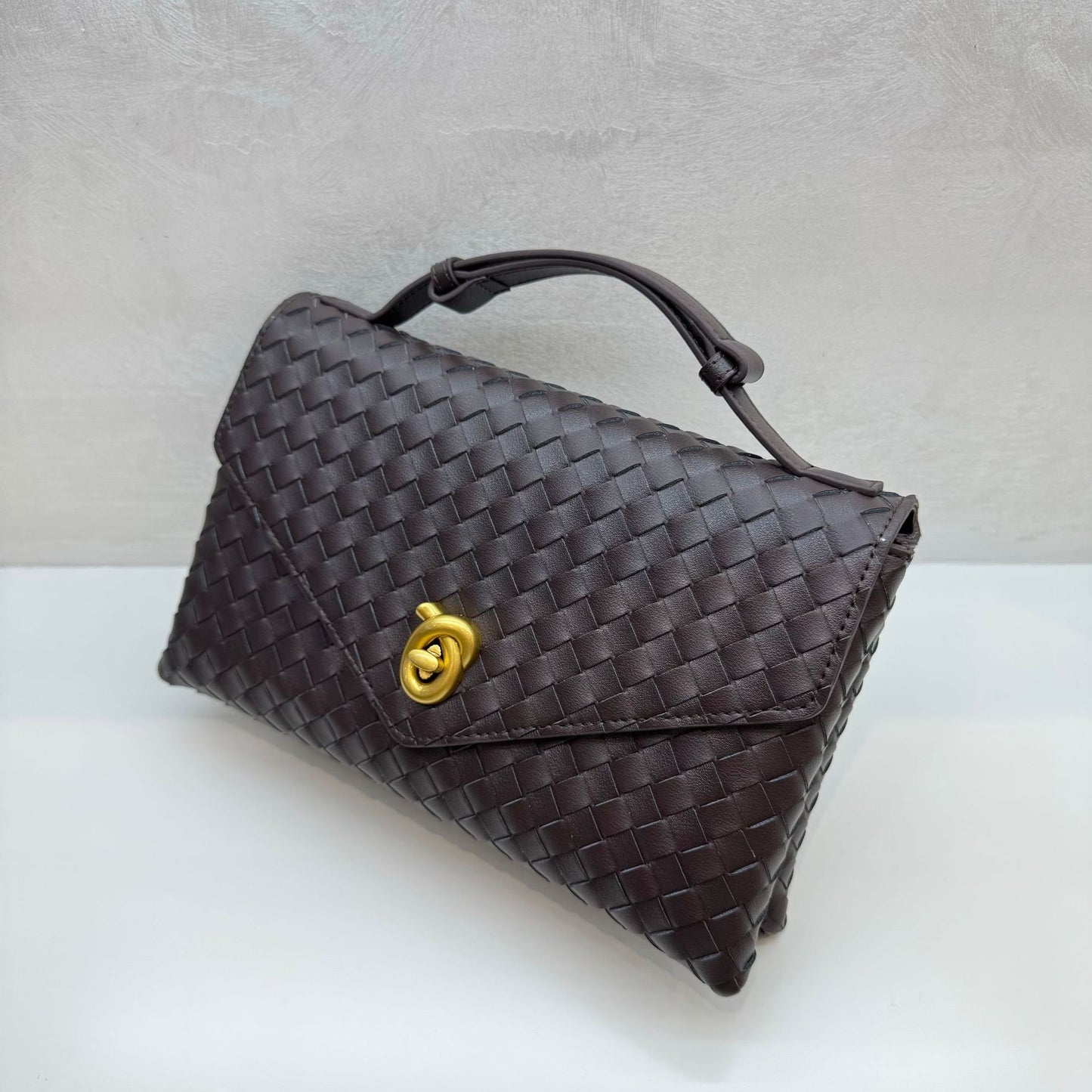 Knot Lock Leather Top Handle Bag