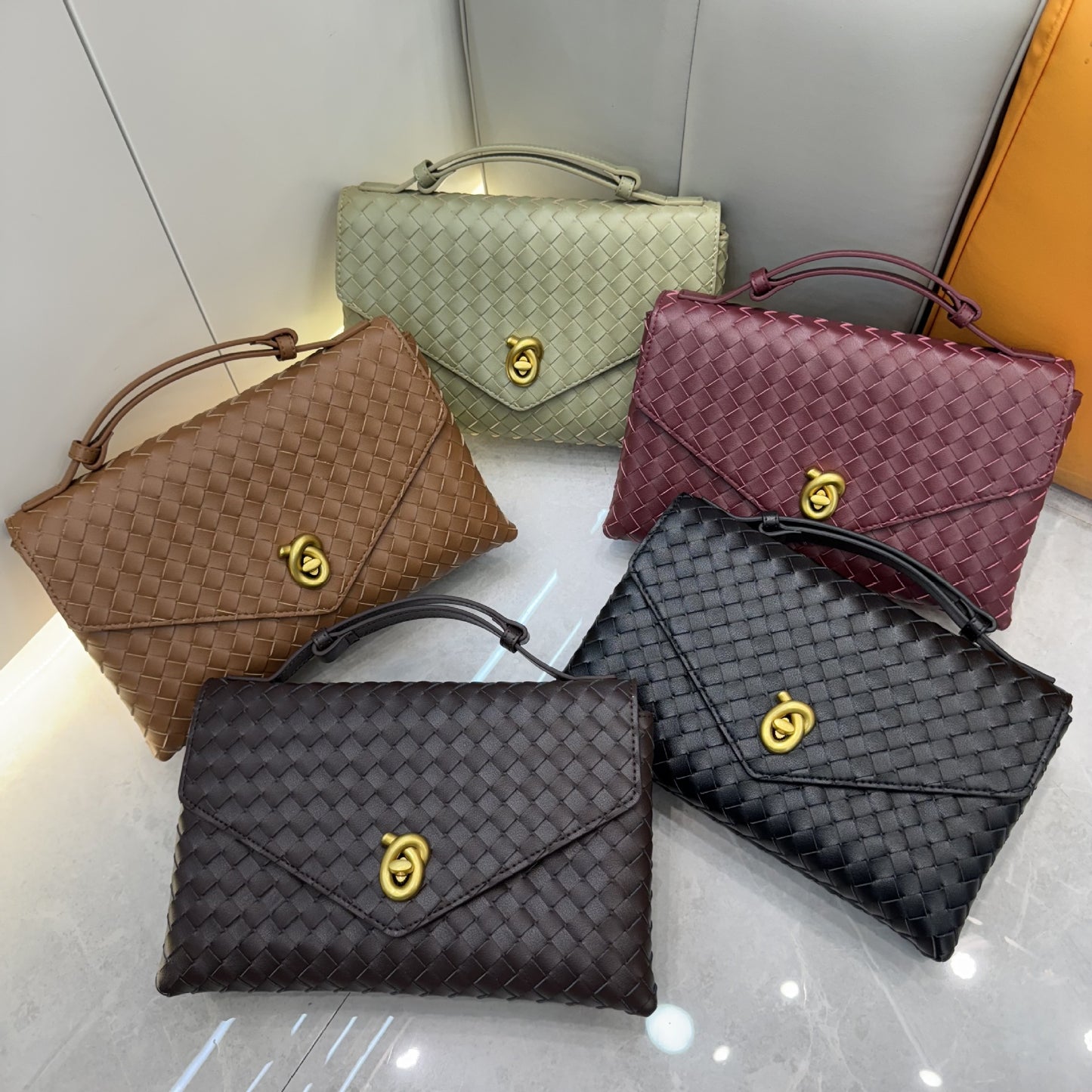 Knot Lock Leather Top Handle Bag