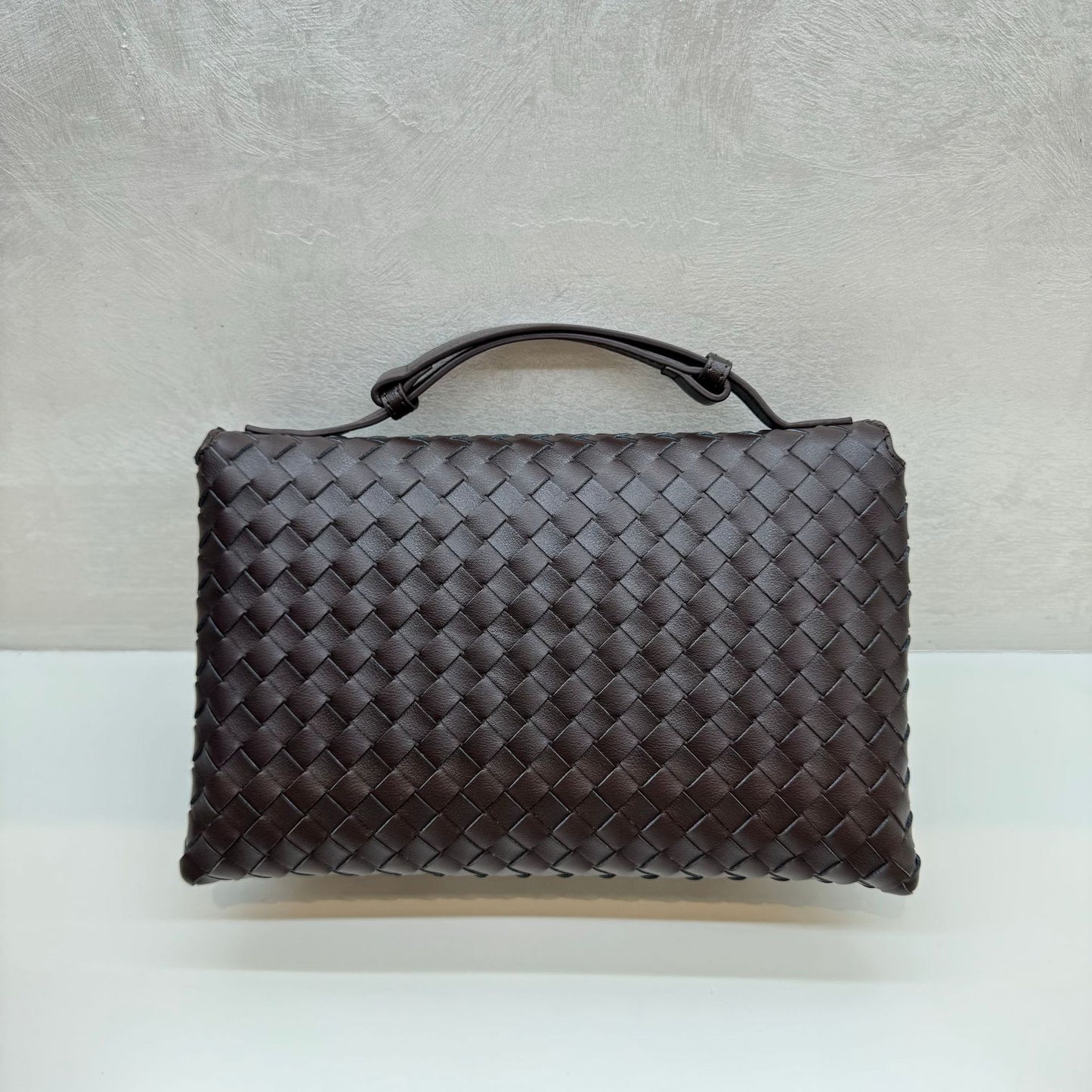Knot Lock Leather Top Handle Bag