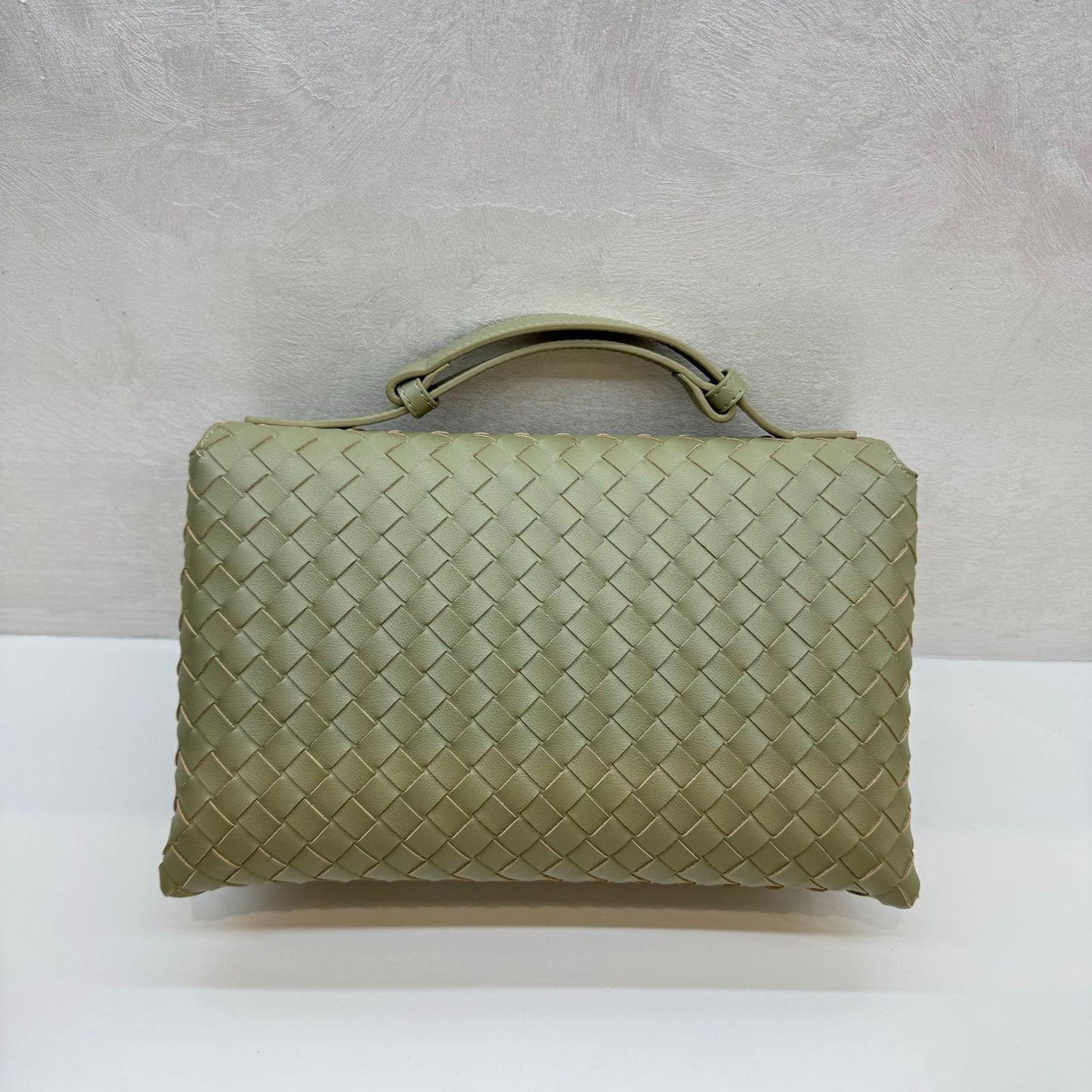 Knot Lock Leather Top Handle Bag