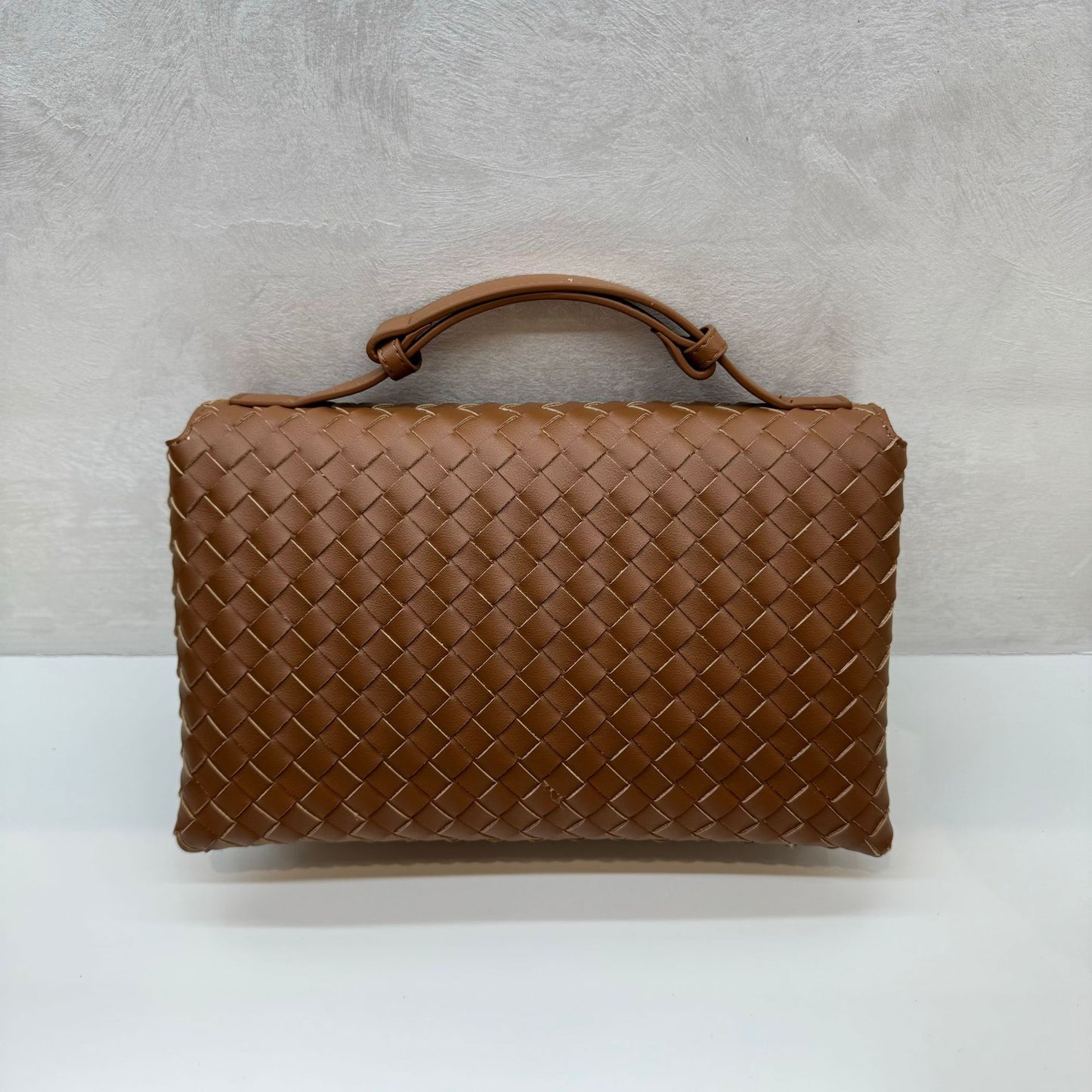 Knot Lock Leather Top Handle Bag