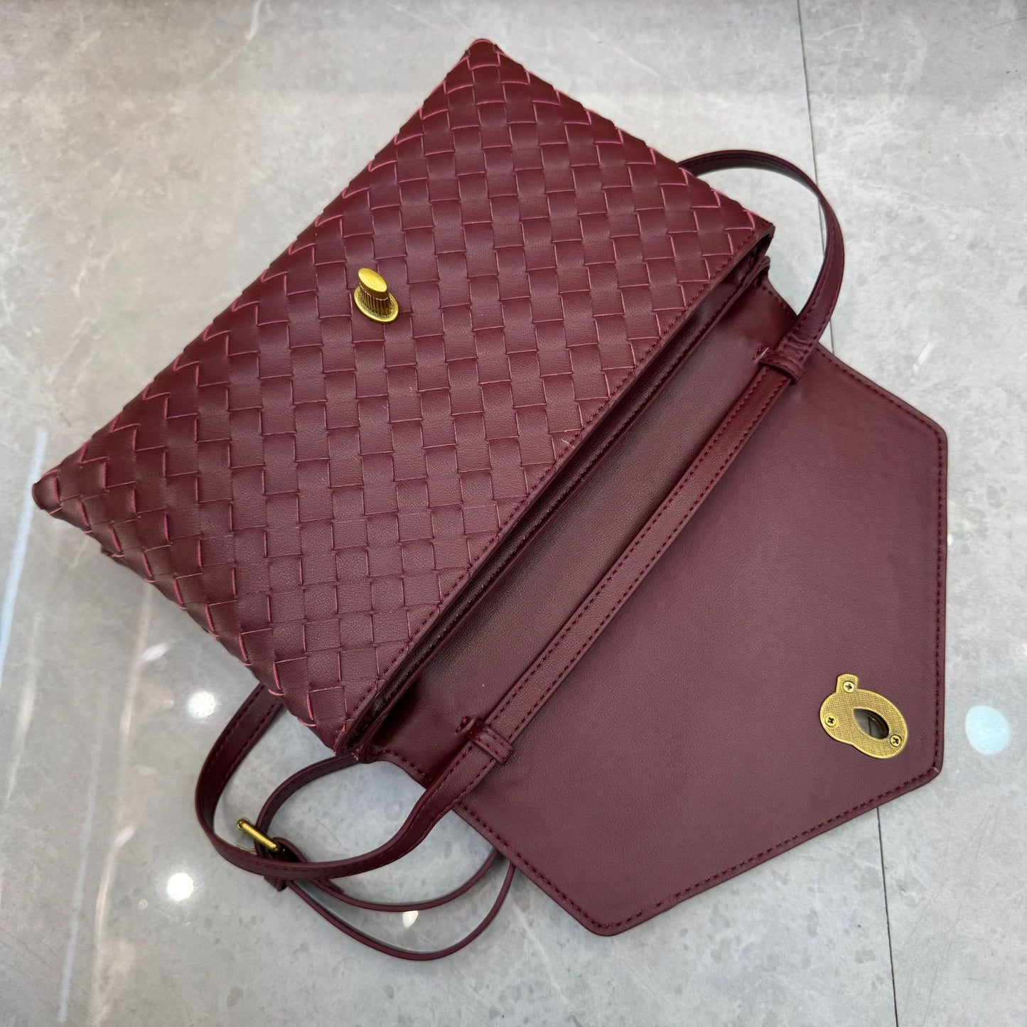 Knot Lock Leather Top Handle Bag